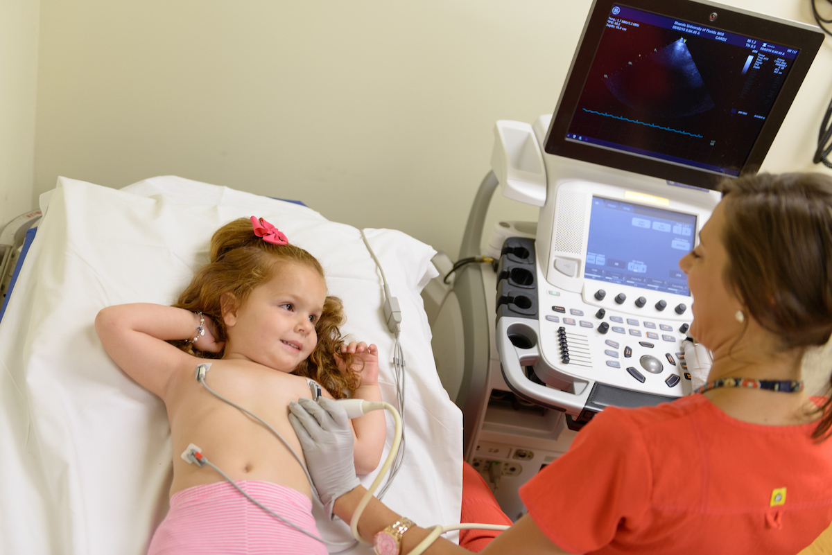 Child receiving an ultrasound.