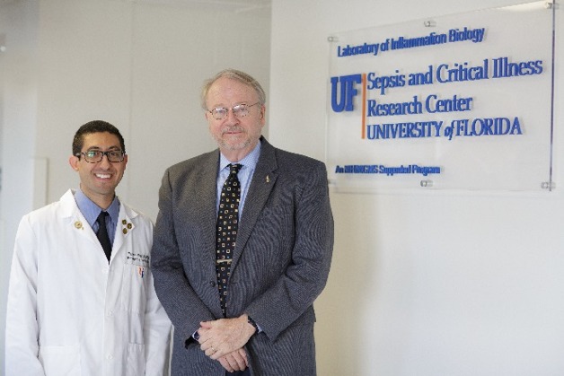 Faheem Guirgis, an assistant professor in the department of emergency medicine and the CTSI’s first KL2 scholar from the UF Health Jacksonville campus, with UF Health Executive Vice President for Research and Education Thomas A. Pearson, who directs the CTSI Translational Workforce Development Program and serves as principal investigator for the KL2 program. Their abstract about UF’s KL2 program was selected for presentation at the national CTSA meeting in October 2016. Photo Credit: Mindy Miller