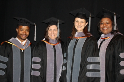 The UF College of Veterinary Medicine's 2015 Distinguished Award winners, from left to right, were: Dr. Glen Wright, Dr. Natalie Isaza, Dr. Johanna Elfenbein and Dr. Lauren Davidson. Wright and Elfenbein received the college's Outstanding Young Alumni Award, Isaza received the Alumni Achievement Award, and Davidson received the Distinguished Service Award. (Photo by Sarah Carey)