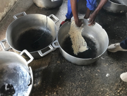 Pots in the prison kitchen at the National Penitentiary in Port-au-Prince. Inmates working in the kitchen use paper or cardboard along with wet flour to seal cracks for one-time use of broken pots. Photo courtesy of Dr. Arch Mainous.