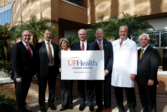 From left, Dr. Wayne Jenkins, president of Orlando Health Physician Partners, Dr. Jamal Hakim, Interim President of Orlando Health and Orlando Health Board Chair Dianna Morgan join UF President Bernie Machen, Dr. David S. Guzick, UF senior vice president senior vice president for health affairs and president of UF Health, Dr. Mark Roh, president of the UF Health Cancer Center at Orlando Health and Timothy M. Goldfarb, CEO of UF Health Shands