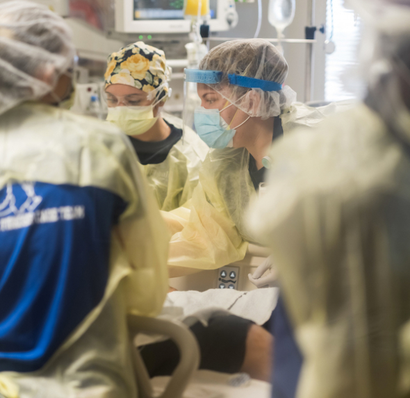 UF Health physicians in an operating room